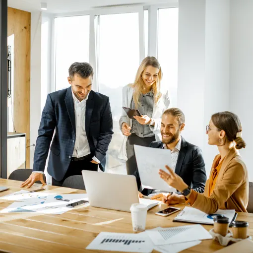 A dedicated offshore engineering team collaborating in an office